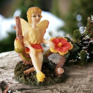 Vintage Fairy Figurine Sitting on Hibiscus Flower Winged Blonde Resin 3.5"
